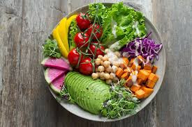 Deconstructed salad presented in a white plate. The simple food presentation ideas